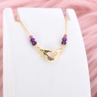 Holding Love Necklace in Multicolor - Image 2